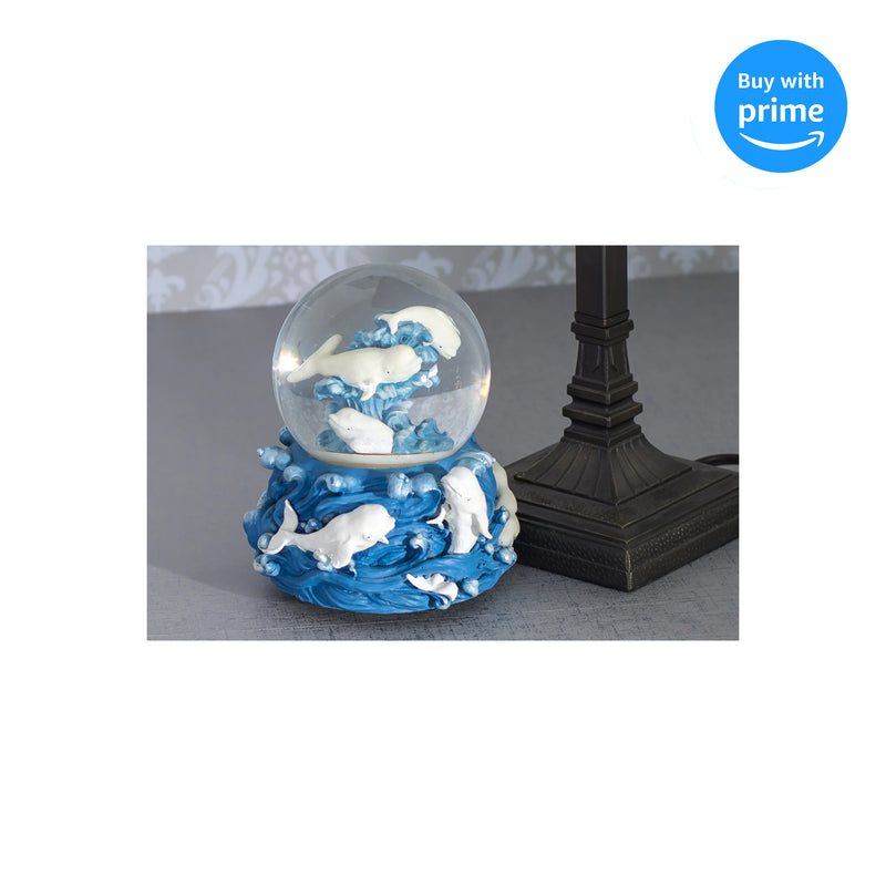 Front view of White Beluga Whale Ocean Figurine Musical Snow Globe