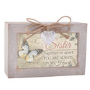 Top down view of Sister Always Heart Petite Locket Distressed Natural Music Box