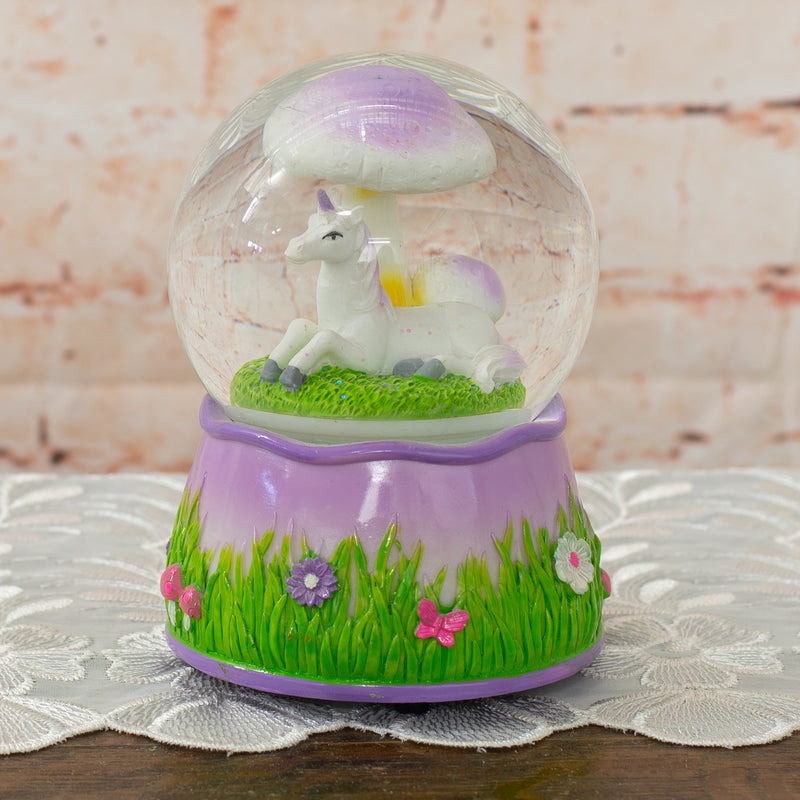 Front view of Purple Unicorn Under Mushroom Rotating Figurine Snow Globe