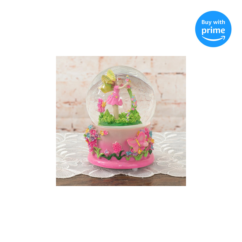 Front view of Magical Fairy in Rotating Garden Musical Snow Globe