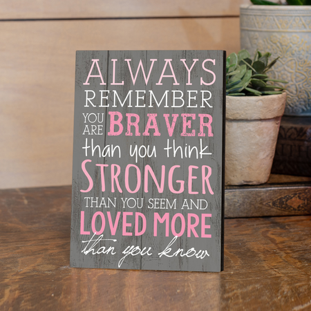 You are Braver than you think, Stronger than you seem, and loved more than you know Plaque with pink text displayed in home