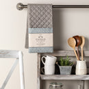 Double oven mitt hanging in kitchen