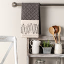 Double oven mitt hanging in kitchen