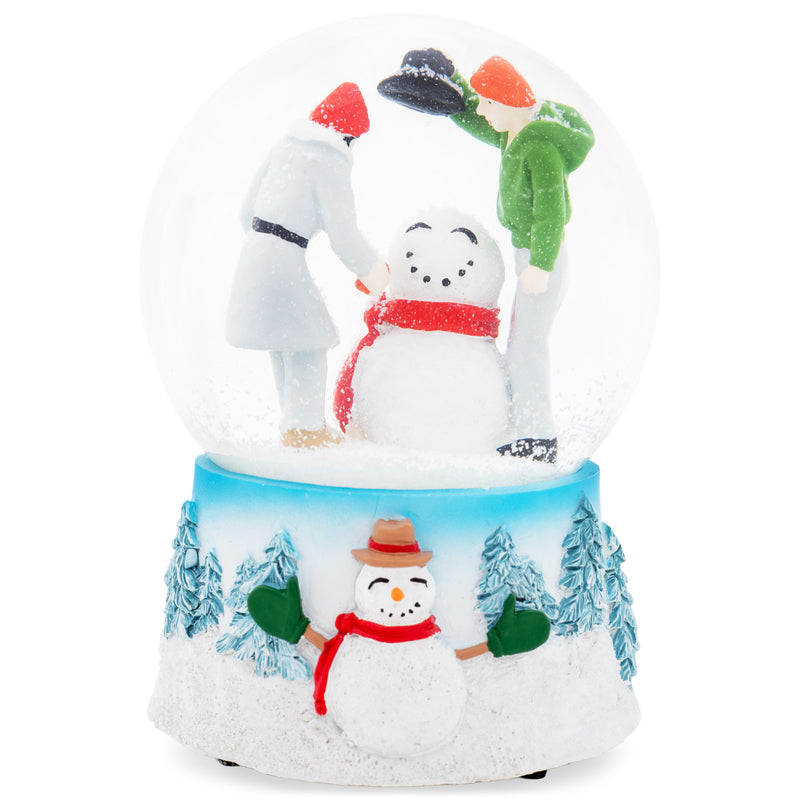 Building Snowman White 5.5 x 3.9 Resin Stone Snow Globe Plays O Christmas Tree