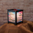 Front view of "Home is where love resides memories are created and friends are always welcome" Black Glass Lantern Warmer