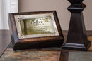 Home décor keepsake and trinket box made with hidden musical mechanism inside