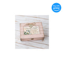 Top down view of Daughter In Law Love Blush Pink Distressed Locket Music Box