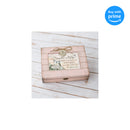 Top down view of Daughter in Law We Love You Blush Pink Distressed Locket Music Box