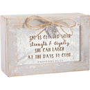 Top down view of She is Clothed with Strength Petite Locket Distressed Natural Music Box