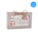 Top down view of Mother in Law Love Petite Locket Distressed Natural Music Box