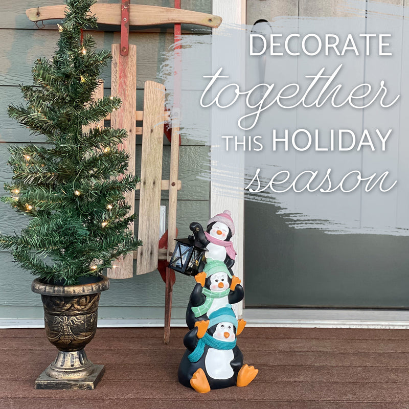 Elanze Designs Penguin Pile Up 17 inch Resin LED Christmas Door Greeter Figurine
