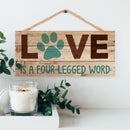 P. Graham Dunn Love is a Four Legged Word Pet Paw 5 x 10 Wood Plank Design Hanging Sign
