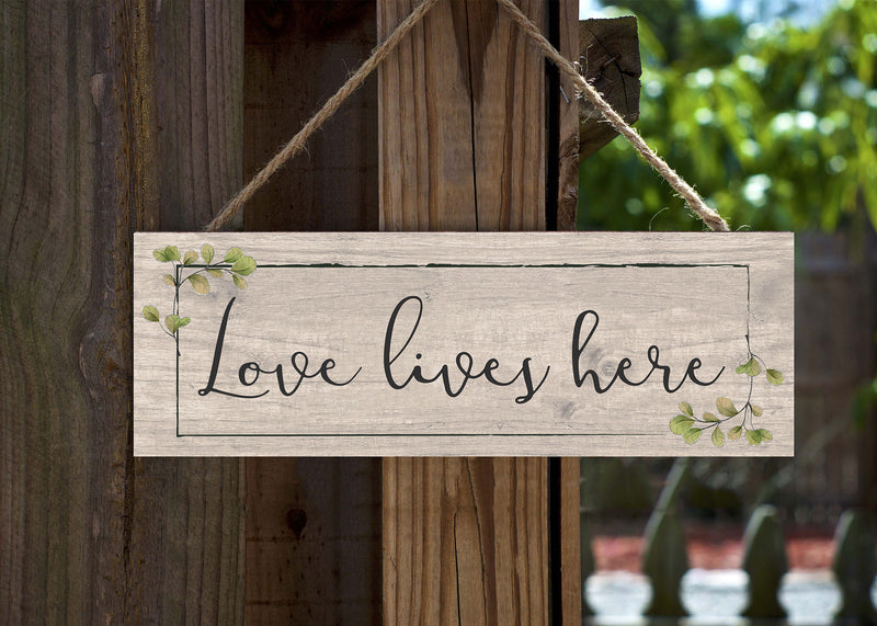 P. Graham Dunn Love Lives Here Whitewash 10 x 3.5 Pine Wood String Sign