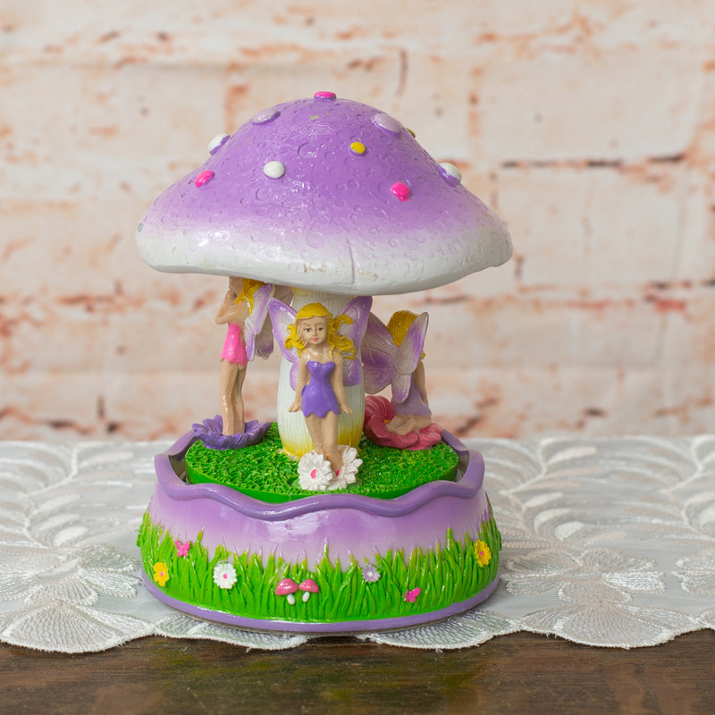 Front view of Purple Mushroom Fairy Musical Carousel 6 inch Rotating Figurine