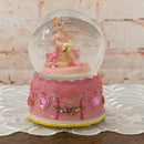 Front view of Ballerina Sitting Pose Rotating Figurine Snow Globe