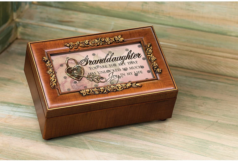 Top down view of Granddaughter Key Woodgrain Embossed Petite Rose Music Box