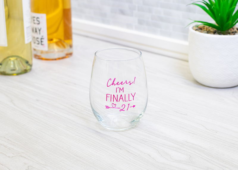 Cheers! Finally 21 Pink 14 ounce Glass Stemless Wine Glass